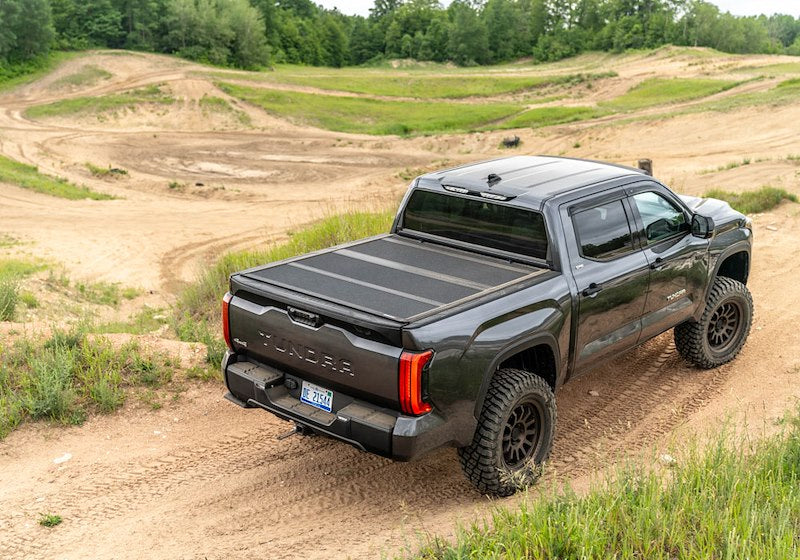 Extang 80350 Tonneau Cover; Endure ALX; Hard Folding; Low Profile; 2 Folds/ 3 Panels; Front Hinge Allows Entire Tonneau to Flip Up When Folded; Textured Powder Coated Matte Black; Aluminum; Lockable Using Tailgate Handle Lock; Without Tool Boxes