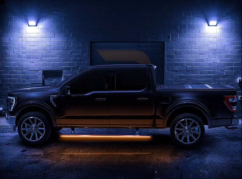 Amp Research Vision Power Running Boards 96255-01A PowerStep™ Vision; Textured Powder Coated; Matte Black; Cast Aluminum; With Remote Operated LED Light System; Rocker Panel Mount; 600 Pound Load Capacity